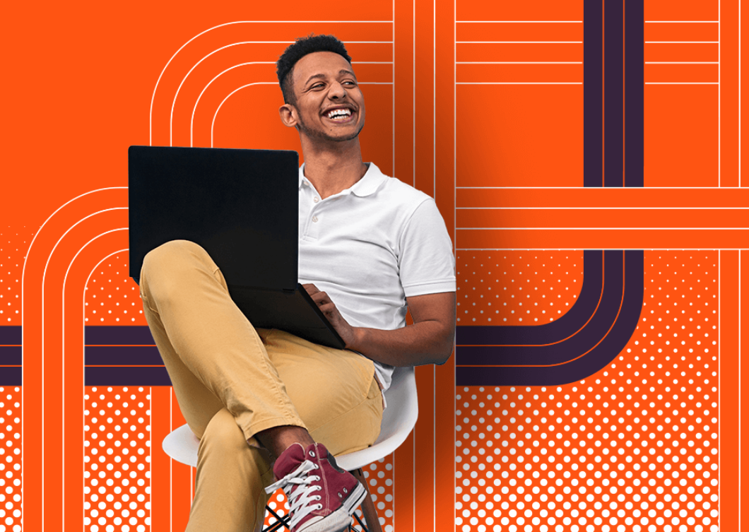 Man sitting with a laptop in his lap with an orange graphic background