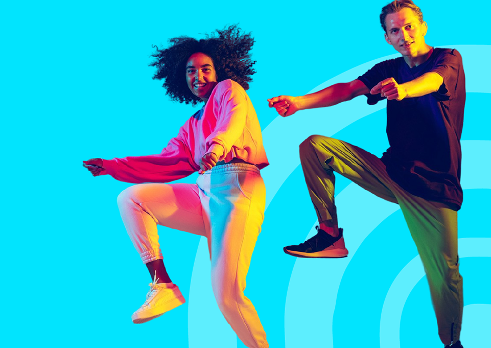 Man and woman dancing on a blue background