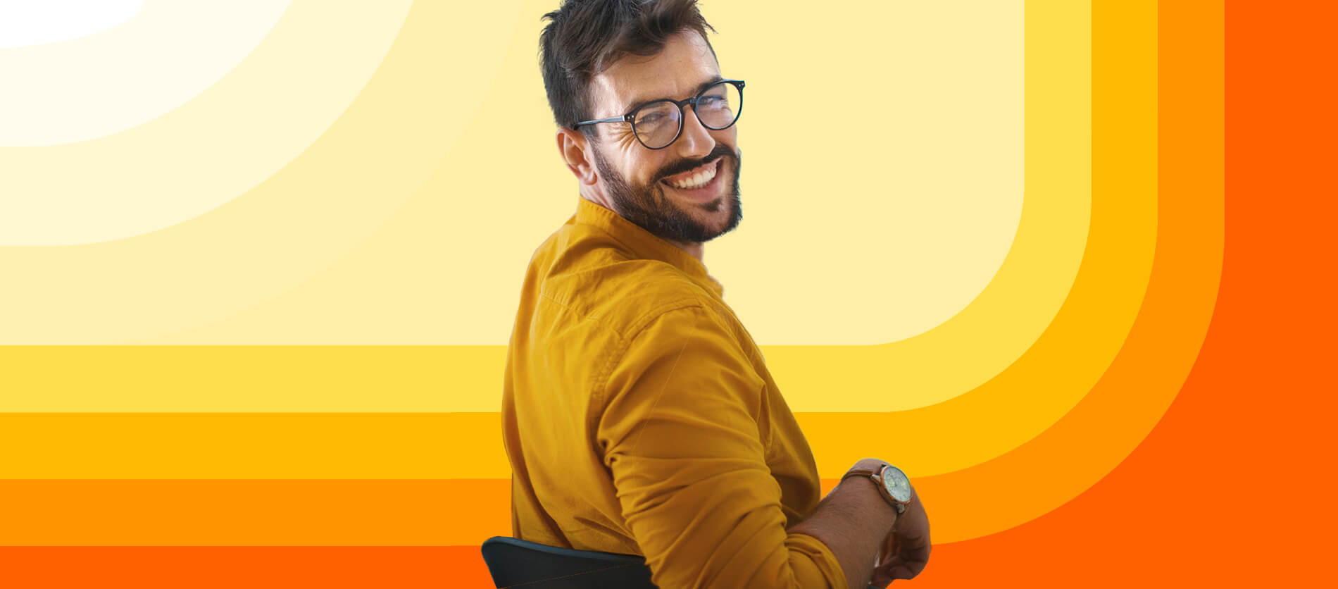 Man smiling yellow background