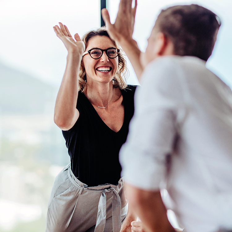 DISQO wins Ad Age's Best Places to Work 2023 - image of people high-fiving